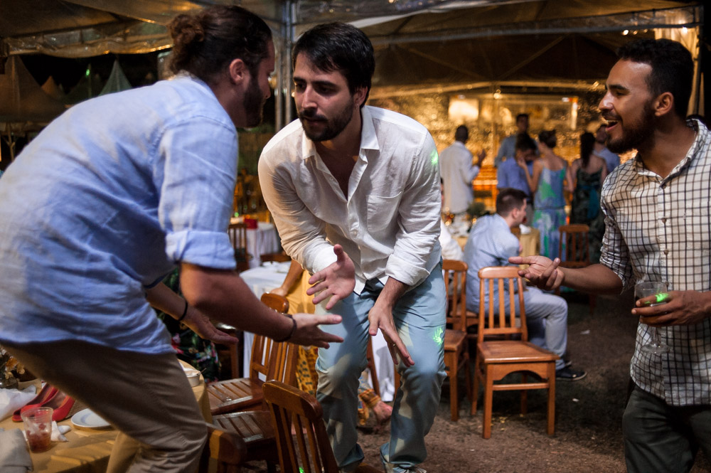 Photo taken with the Nikon 35mm f2D of a groom dancing with his friends