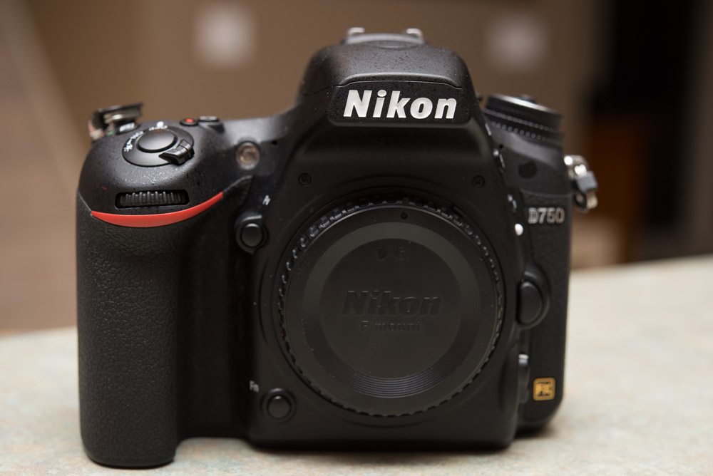 picture of the Nikon d750 from the front with the body cap on