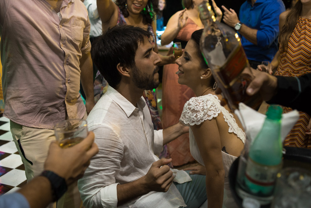 Image of a bride and groom getting low on the dance floor of their wedding reception