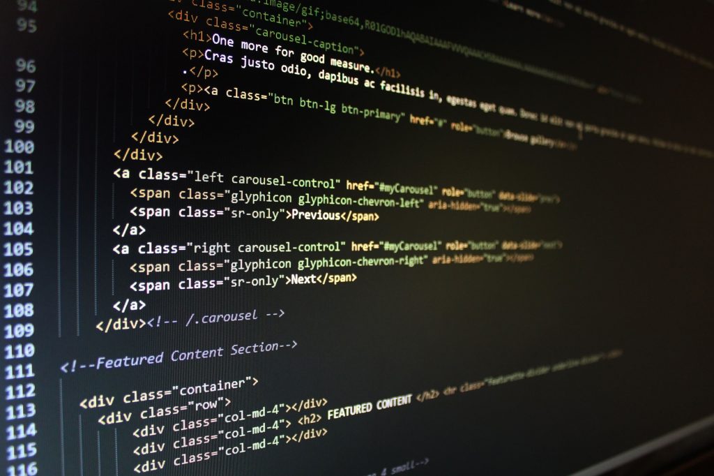 Image of HTML code on a computer as an example of using your own website to sell landscape photography work