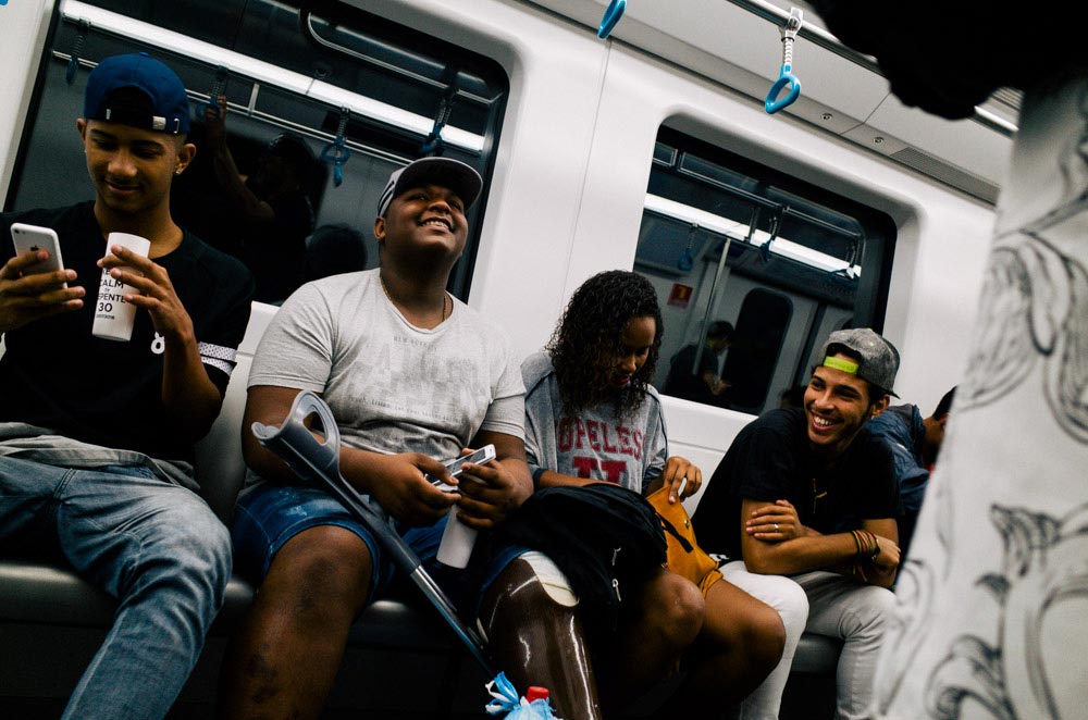 Street photography image shot on a subway with a 28mm lens