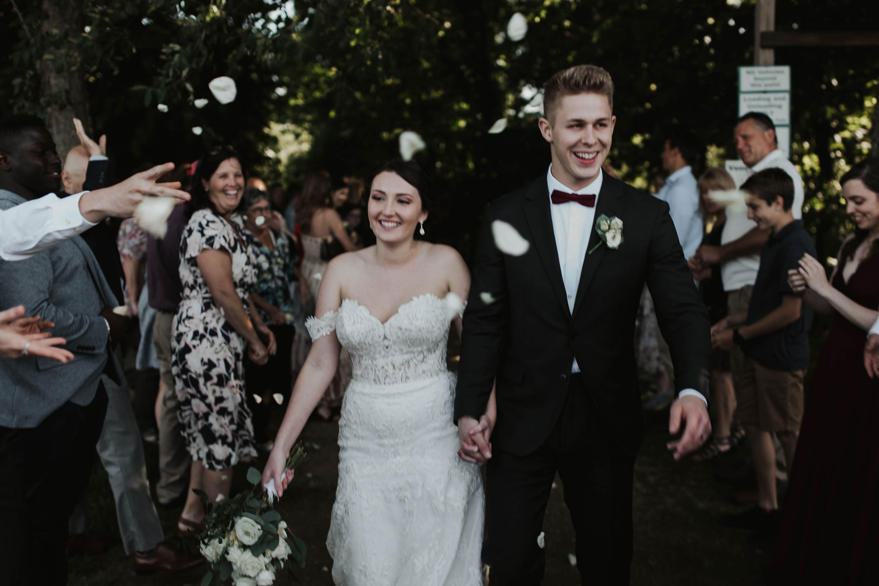 A couple leaving their wedding ceremony.