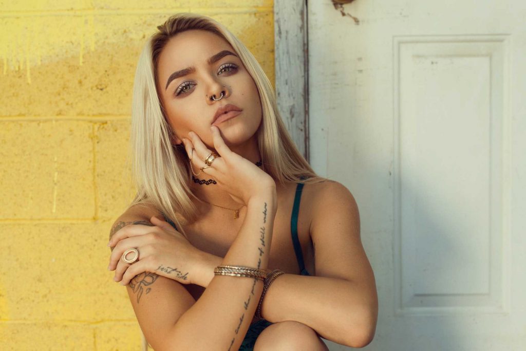 Modeling photo of a blonde woman with jewelry on