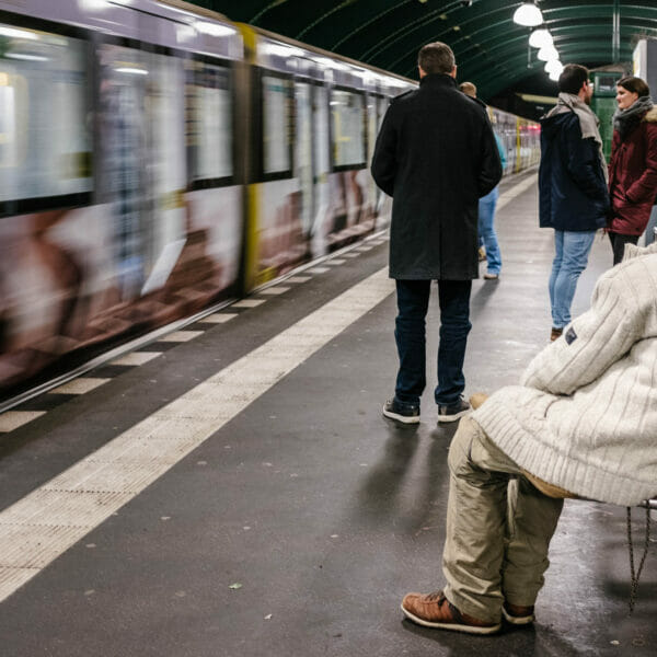 People waiting for a subway train.