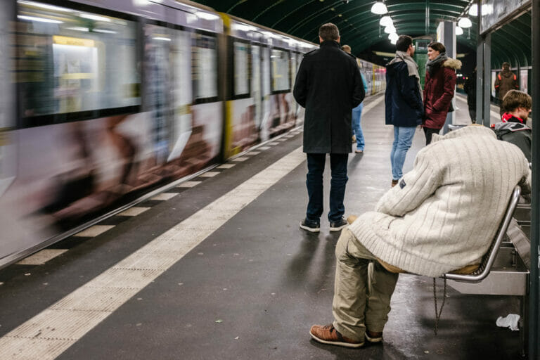 People waiting for a subway train.