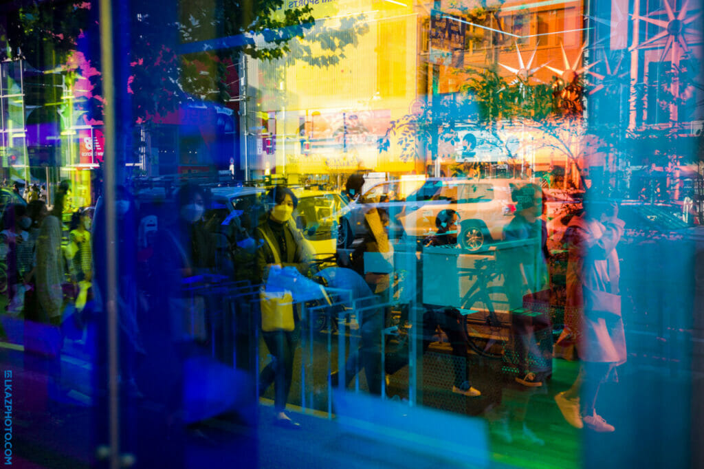 A colorful reflection in a glass window.