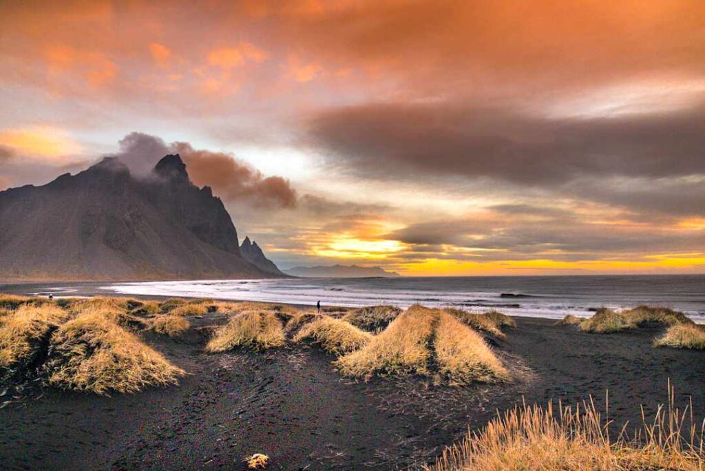 A rocky beach and mountain.